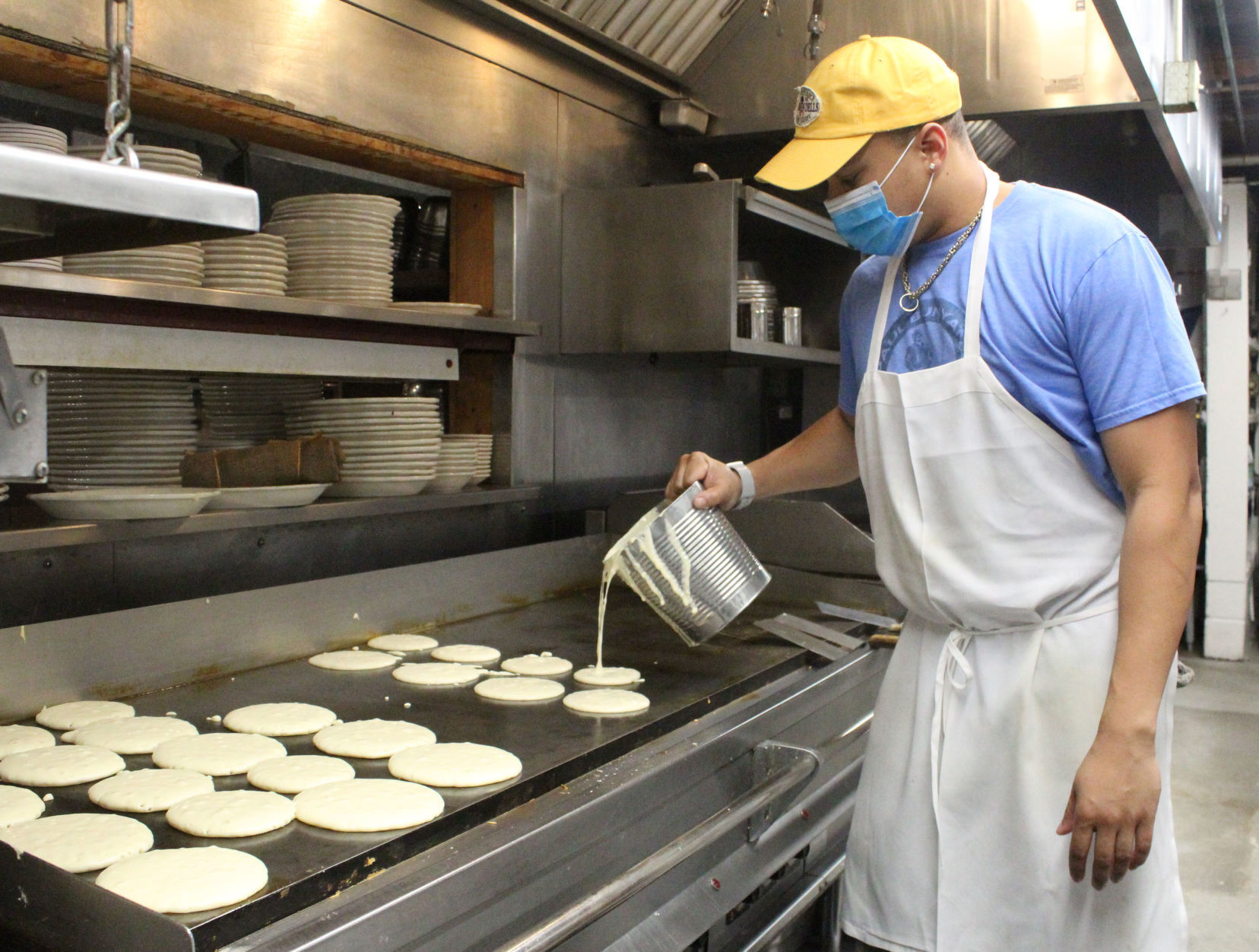 Munir makes pancakes